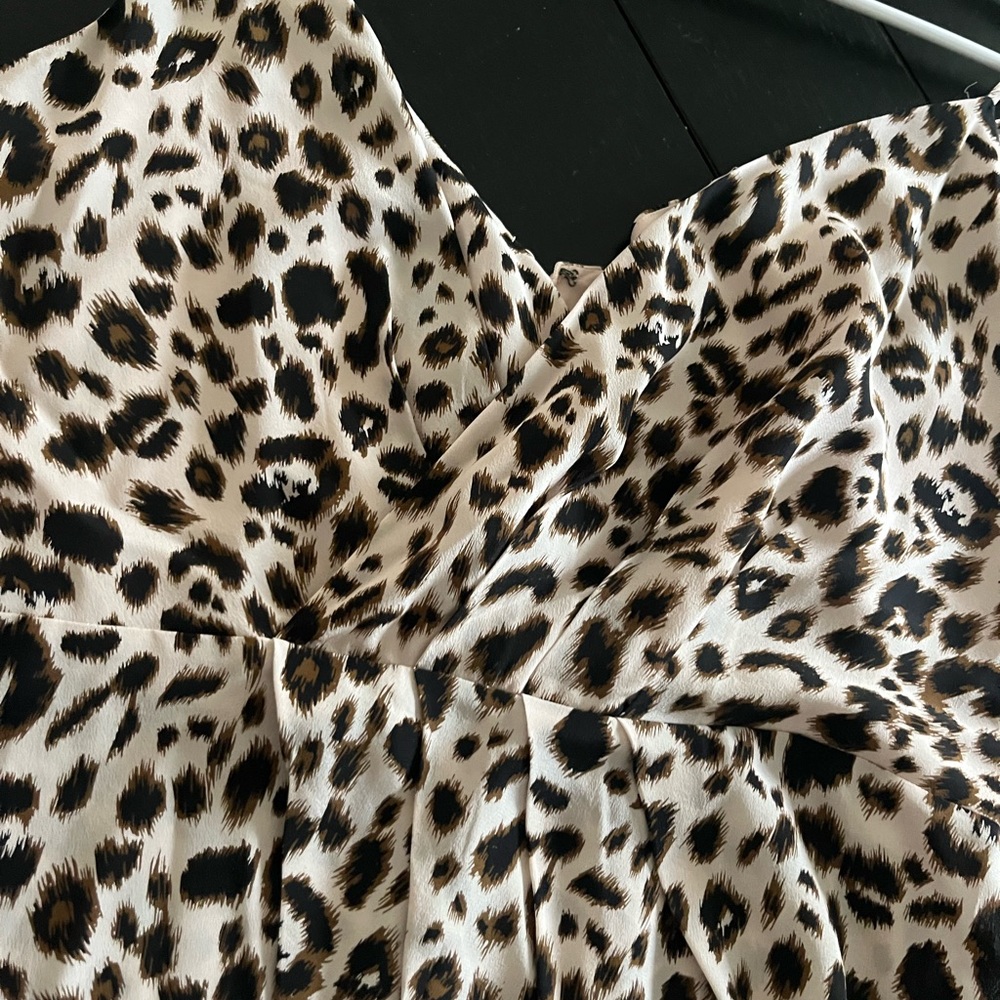 Romantic snake skin low cut silk top. Brand new